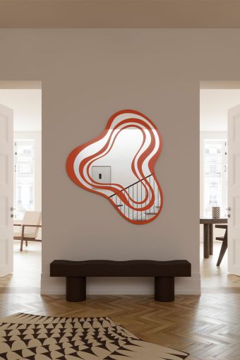 Nimbus Orange irregular wall mirror styled in an interior, highlighting orange and clear mirrored glass.