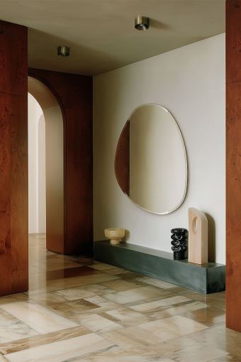 Pure L irregular wall mirror styled in an interior, highlighting irregular organic-shaped wall mirror.