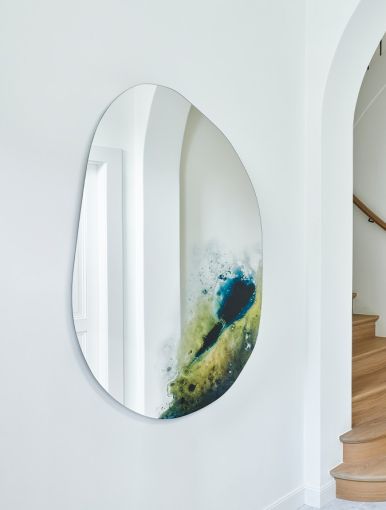 Comète RB irregular wall mirror styled in an interior, highlighting irregular-shaped wall mirror.