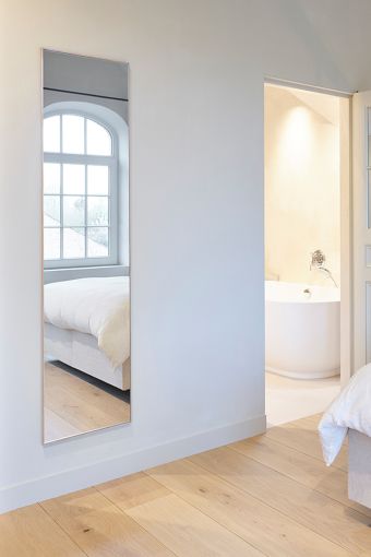 Lucka Oak Hall rectangular wall mirror styled in an interior, highlighting solid oak frame.