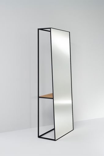 Chassis XL Black irregular freestanding mirror, showing free-standing mirror, measuring 65 x 170 cm.