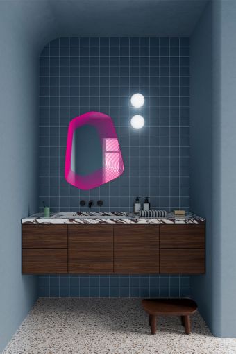 Vibe Pink irregular wall mirror styled in an interior, highlighting irregular-contour wall mirror.